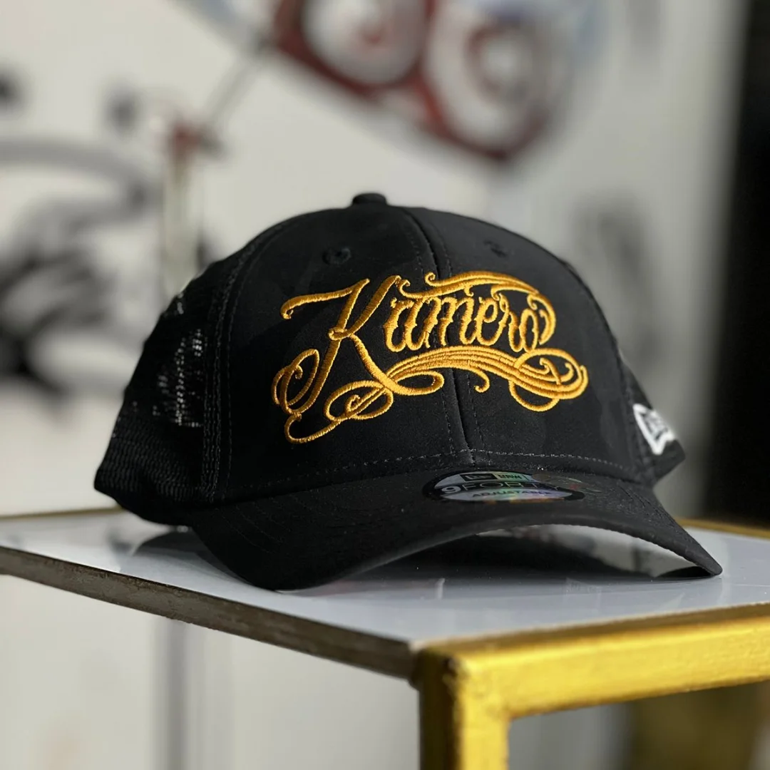KAMERO CURSIVE LEATHER TRUCKER